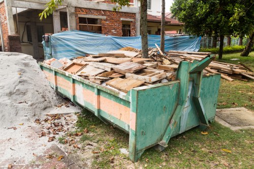 Skip Hire Barkingside team assisting a customer