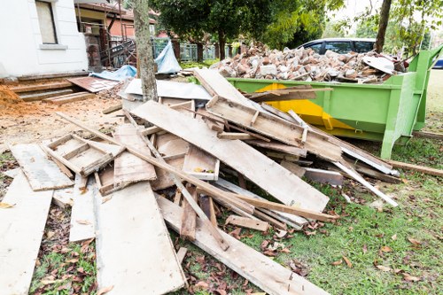 Professional team handling demolition waste removal